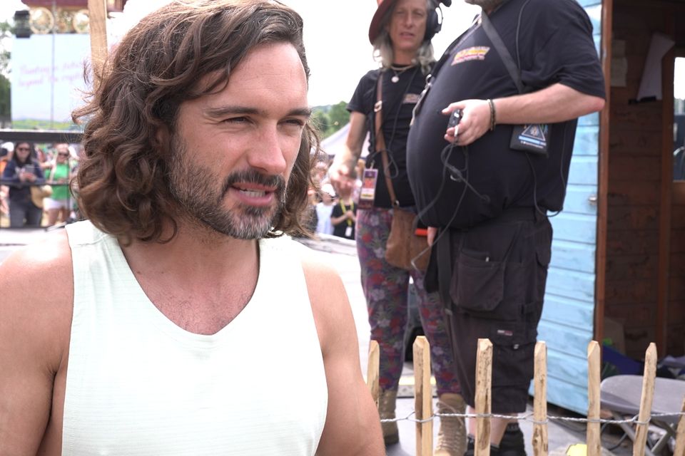 Joe Wicks is putting revellers through their paces at Glastonbury (PA)