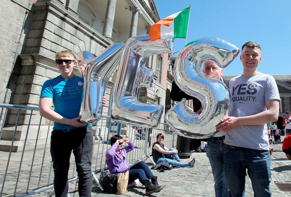 Supporters for same-sex marriage hold an inflatable Yes sign as they wait for the announcement on the referendum in Dublin castle on May 23, 2015. Ireland appeared to have voted to allow gay marriage today in a historic referendum which would see the historically Catholic country become the world's first to make the change after a popular vote.
AFP PHOTO /  Paul FaithPAUL FAITH/AFP/Getty Images