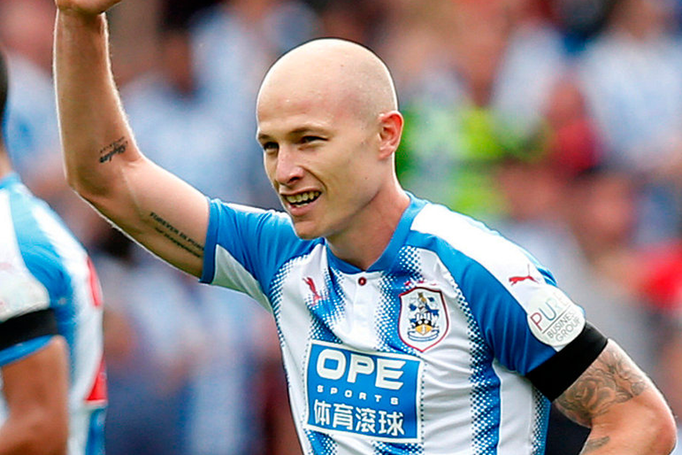 Huddersfield's Aaron Mooy celebrates his goal