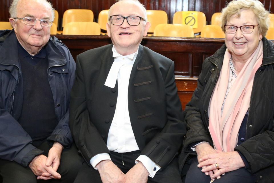 Judge Brian Sheridan pictured with his brother Desmond (Mullingar) and his sister in law Patricia in Mallow Courthouse during his retirement gathering