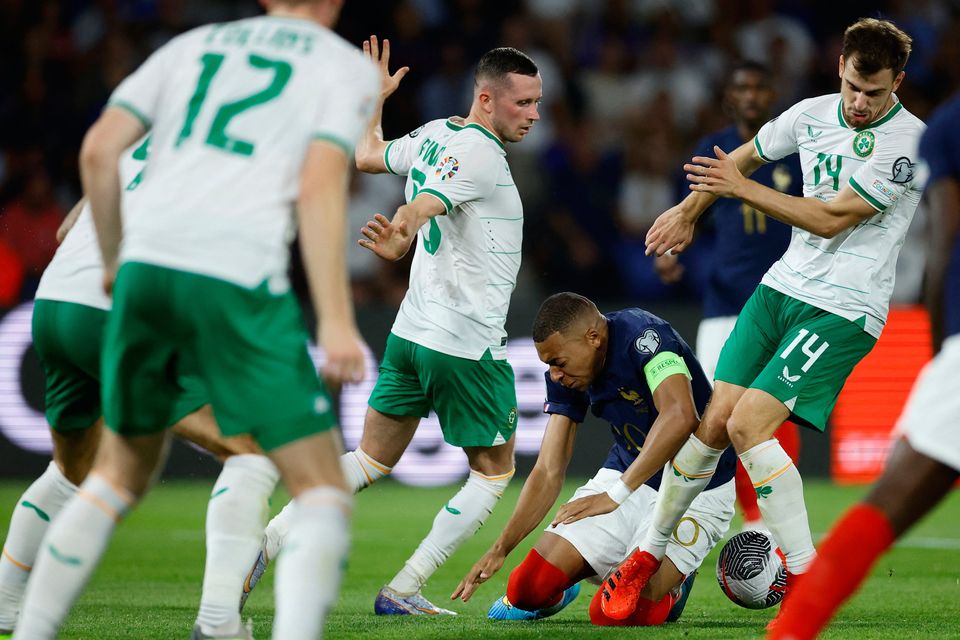 France's Kylian Mbappe in action with Ireland's Jayson Molumby during the Euro 2024 Group B qualifier at Parc des Princes, Paris