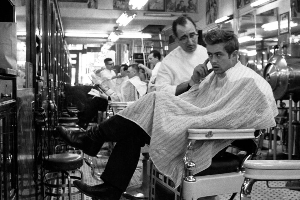 James Dean at a barbershop nears Times Square in New York. Photo: Dennis Stock.