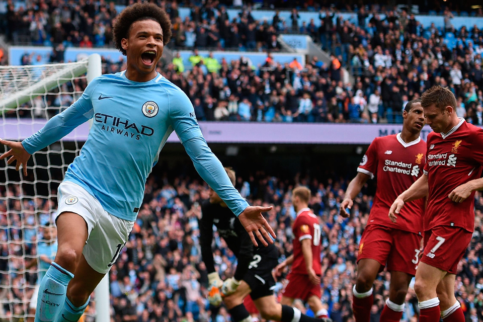 Manchester City's German midfielder Leroy Sane celebrates after scoring their fourth goal. Photo: Getty Images