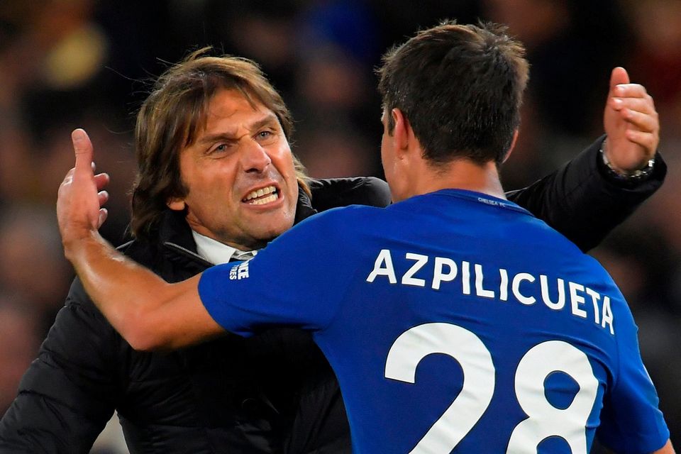 Chelsea manager Antonio Conte celebrates after the match with Cesar Azpilicueta