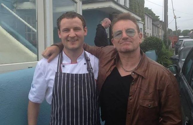 Bono has a pint of the black stuff at O'Grady's on the Pier in Barna