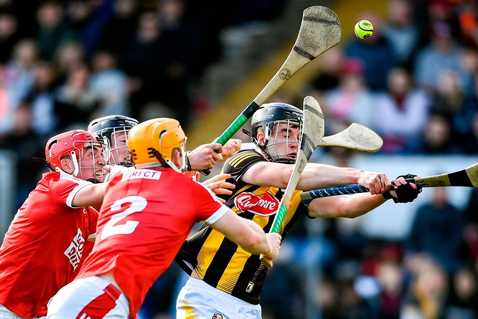 Billy Drennan of Kilkenny is tackled by Cork players, from left, Damien Cahalane, Ciarán Joyce and Niall O’Leary resulting in a penalty being awarded during their league semi-final in Nowlan Park. Photo: David Fitzgerald/Sportsfile