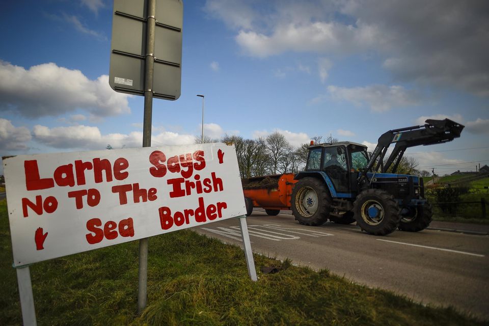 A sign with a message against the Brexit border checks in Larne, Co Antrim. Photo: REUTERS/Clodagh Kilcoyne