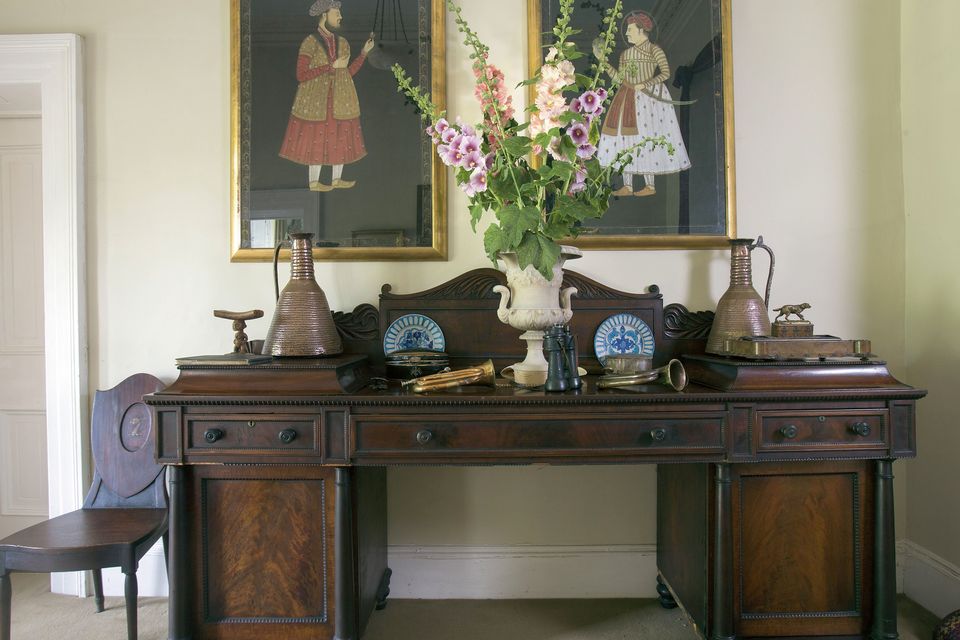 The hall is furnished with a treasure trove of old pieces. The desk is from Drishane Castle, home of one branch of Robert‘s family. The art is a mix of Moghul art and family heirlooms