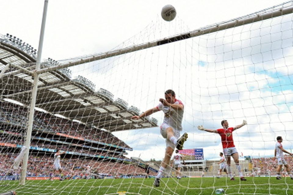 Conor Gormley, Tyrone, kicks the ball in frustration after Alan Freeman scored a goal for Mayo. The goal was subsequently disallowed and a free kick awarded to Mayo.