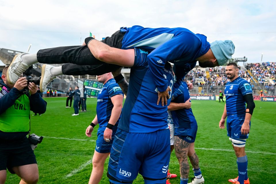 RG Snyman of Leinster carries teammate Jamison Gibson-Park as they celebrate after the United Rugby Championship Grand Final at Croke Park. Photo by Brendan Moran/Sportsfile