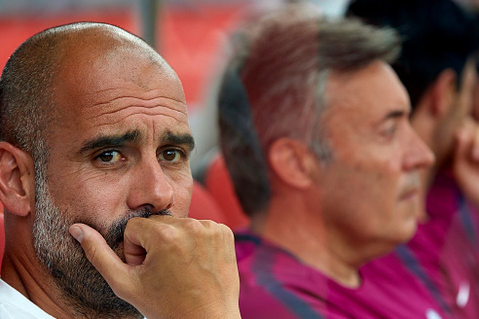 Pep Guardiola, Manager of Manchester City looks on prior to the pre-season friendly match between Girona and Manchester City at Municipal de Montilivi Stadium on August 15, 2017 in Girona, Spain.  (Photo by Manuel Queimadelos Alonso/Getty Images)