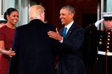 thumbnail: President-elect Donald Trump(C)is greeted by US President Barack Obama and First Lady Michelle Obama(L) as he arrives at the White House