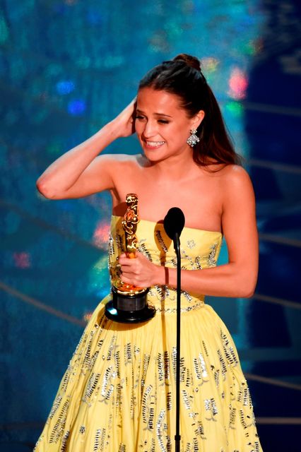 Actress Alicia Vikander accepts the Best Supporting Actress award for 'The Danish Girl' onstage during the 88th Annual Academy Awards at the Dolby Theatre on February 28, 2016 in Hollywood, California.  (Photo by Kevin Winter/Getty Images)