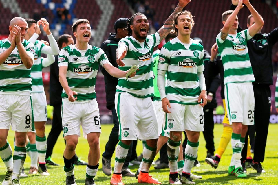 Celtic players celebrate beating Hearts and all but winning the Ladbrokes Scottish Premiership