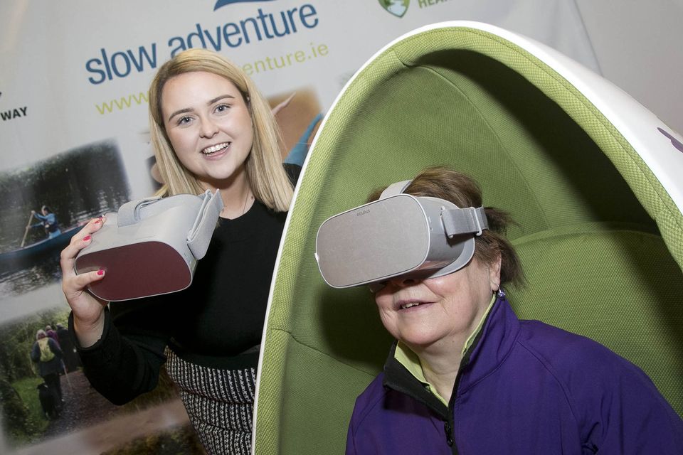 Michelle Whelan, from Lough Rynn Castle with Phyl Foley, from Leitrim Tourism, trying the new VR experience at Holiday World. Photo: Colm Mahady / Fennell Photography