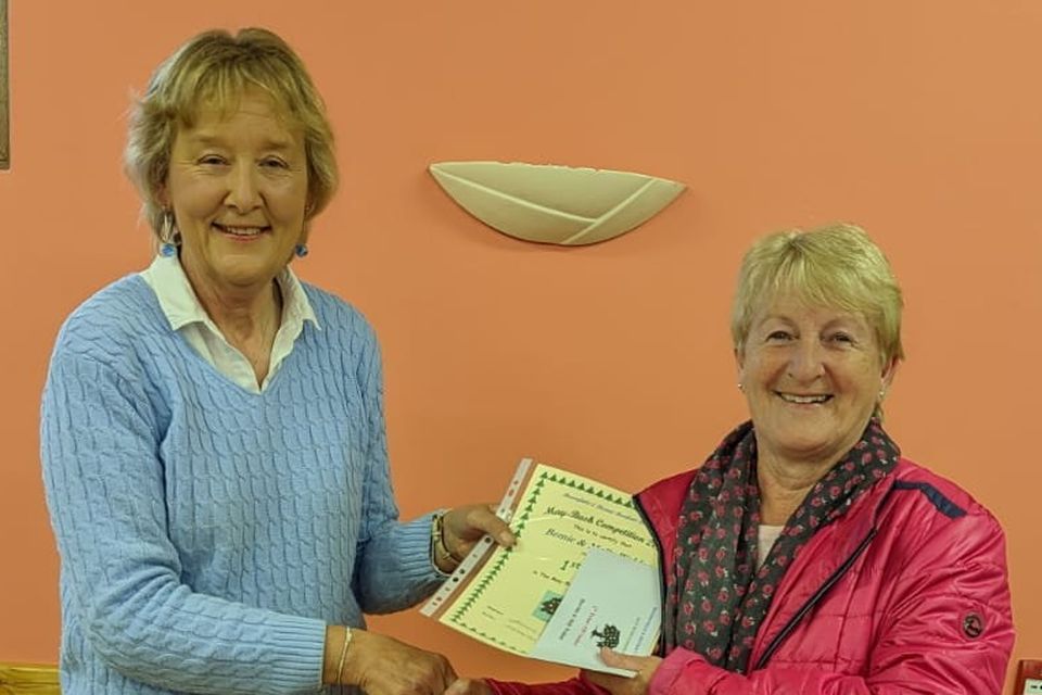 At the presentation of prizes for the May Bush Competition in Teach Raithneach was competition Judge Josephine Sullivan presenting 1st Prize to Bernie Weldon.