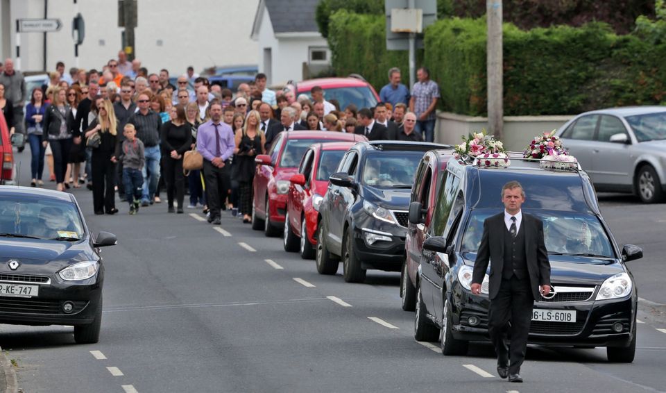 The funeral cortege makes its way to the cemetary at the funeral of Angela Kelly who was one of three people killed in a car crash last Sunday at Middlemount on the R433 Rathdowney to Abbeyleix Road