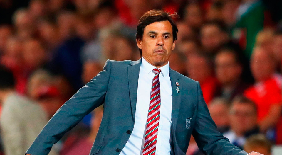 Wales manager Chris Coleman controls the ball on the touchline   Photo: Getty