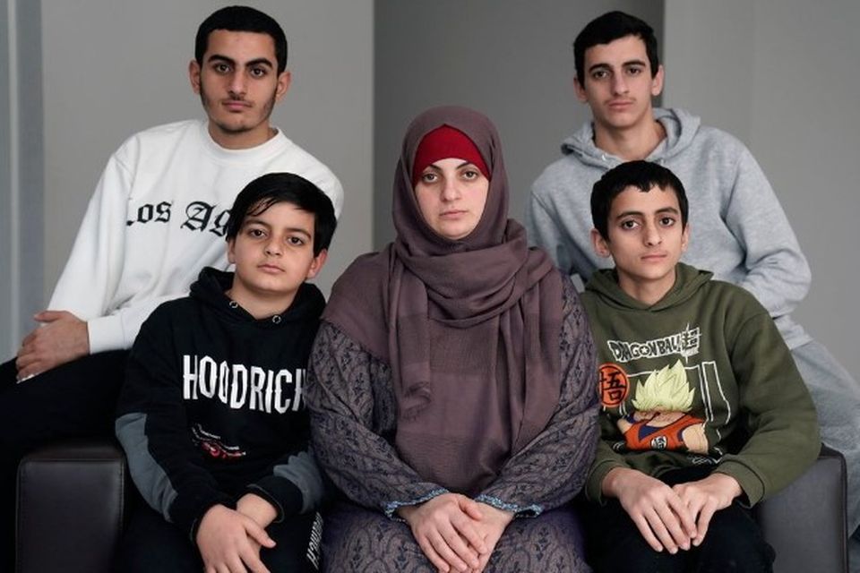 Zak Hania's wife Batoul and their four sons Nourmohammed, 11, (front left), Ahmed, 14, (front right), Mazen, 19, (back left) and Ismael, 17, (back right). Photo: Brian Lawless/PA Wire