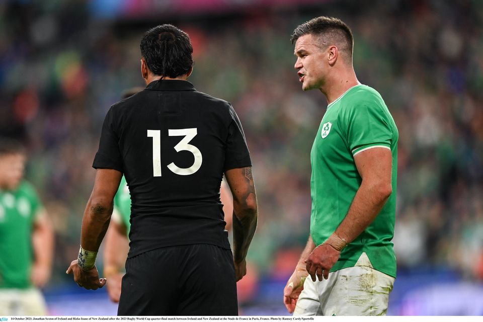 Ireland's Jonathan Sexton and New Zealand's Rieko Ioane exchange pleasantries at the Stade de France in Paris, France. Photo: Ramsey Cardy/Sportsfile