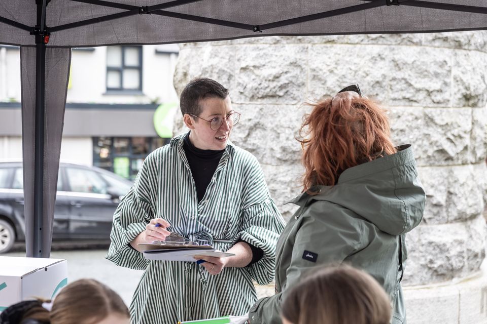Kate Strain of Kunstverein Aughrim gathering feedback via the Suppose a Stone Survey. Photo: Ste Murray.