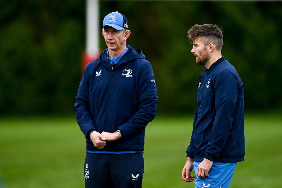 Leinster head coach Leo Cullen with Ross Byrne.