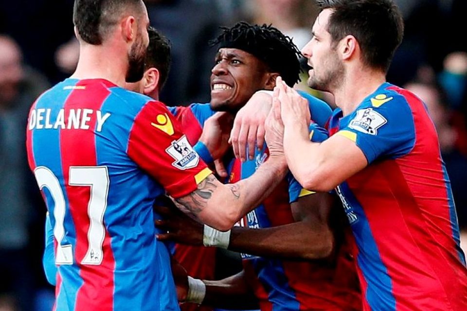 Crystal Palace's Wilfried Zaha celebrates with team mates after Tottenham's Jan Vertonghen (not pictured) scores an own goal and Crystal Palace's first
Reuters / Stefan Wermuth