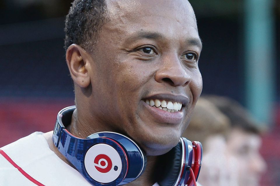 BOSTON - APRIL 04:  Producer and musician Dr. Dre is on the field before the Boston Red Sox take on the the New York Yankees on April 4, 2010 during Opening Night at Fenway Park in Boston, Massachusetts. Dre is promoting the Boston Red Sox version of his Beats by Dr. Dre headphones.  (Photo by Elsa/Getty Images)
