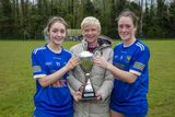 thumbnail: Coláiste Bhríde Principal Linda Dunne presents the Wicklow Schools Senior 'A' football cup to Coláiste Bhríde captains Yasmin Dagge and Laci-Jane Shannon after their win over St. Mary's College.  