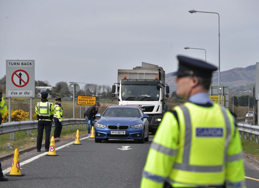 Gardaí at a traffic checkpoint. Photo: Charles McQuillan/Getty 