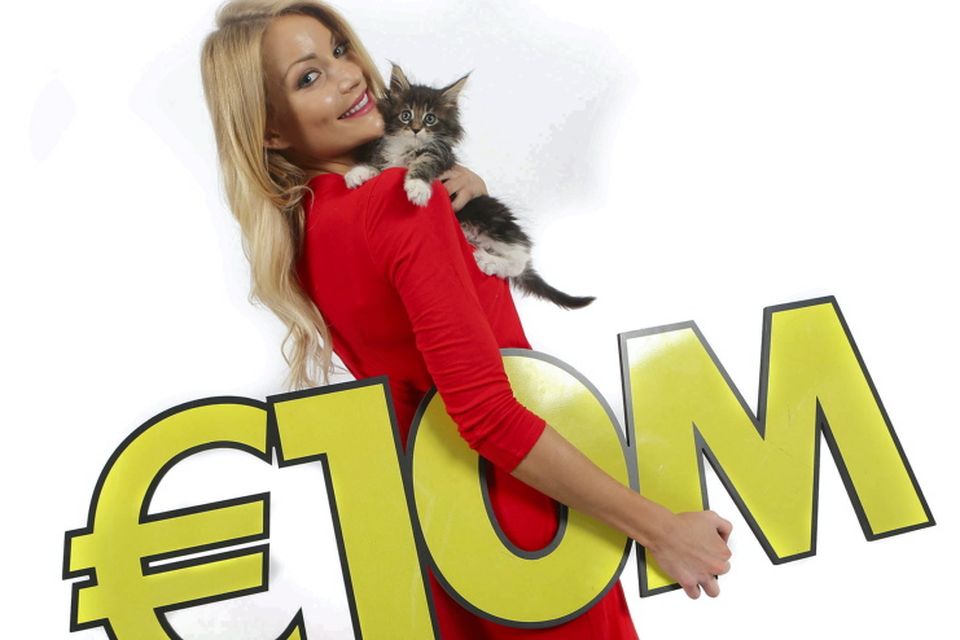 Model Kerri-Nicole Blanc and her litter of 10 lucky kittens celebrate Wednesday’s big Lotto jackpot which is an estimated €10 million