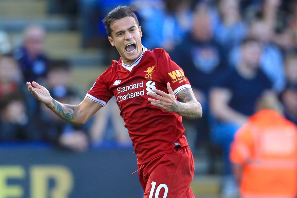 Liverpool's Philippe Coutinho celebrates his goal in their 3-2 win at Leicester.