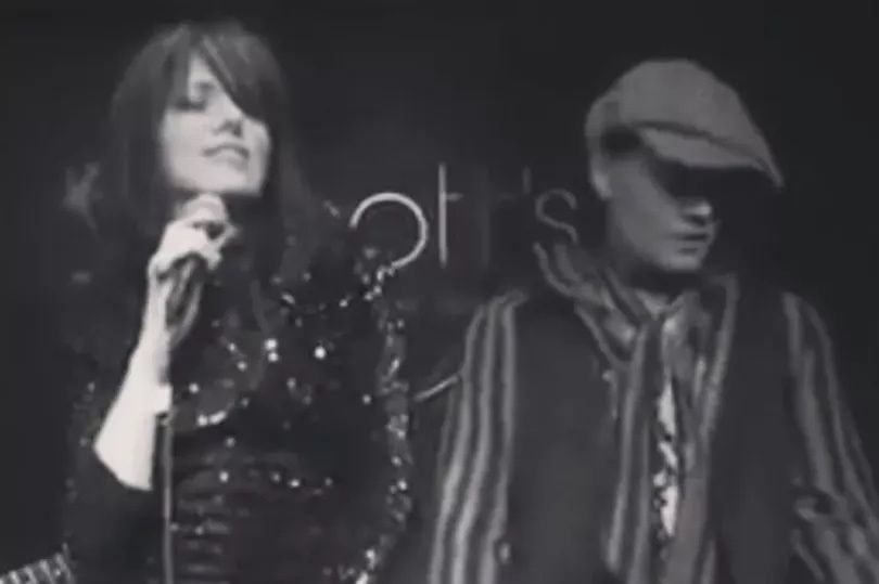 Imelda and Johnny Depp performing together on stage