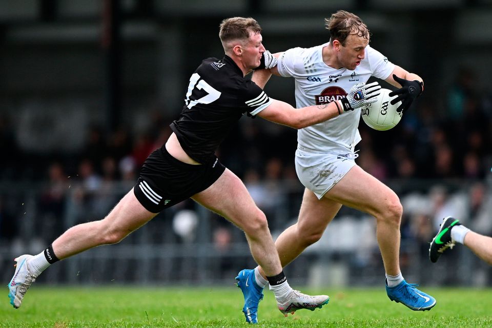 Kildare's Darragh Kirwan in action against Alan Reilly of Sligo at Markievicz Park earlier this afternoon. Photo by Ramsey Cardy/Sportsfile