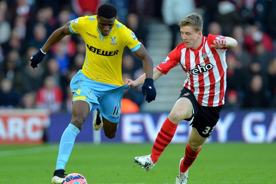 Crystal Palace's English midfielder Wilfried Zaha (L) vies with Southampton's English defender Matt Targett (R) during the FA Cup fourth round football match between Southampton and Crystal Palace at St Mary's Stadium