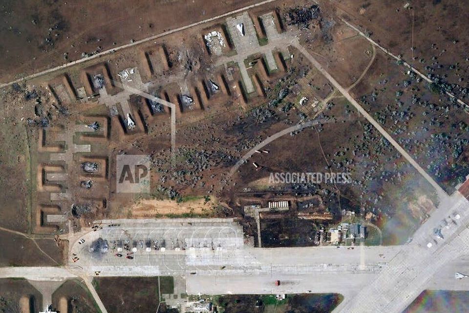 This satellite image provided by Planet Labs PBC shows destroyed Russian aircraft at Saki Air Base after an explosion Tuesday, Aug. 9, 2022, in the Crimean Peninsula, the Black Sea peninsula seized from Ukraine by Russia and annexed in March 2014. Ukraine’s air force said Wednesday, Aug. 10, 2022 that nine Russian warplanes were destroyed in a deadly string of explosions at an air base in Crimea that appeared to be the result of a Ukrainian attack, which would represent a significant escalation in the war. (Planet Labs PBC via AP)