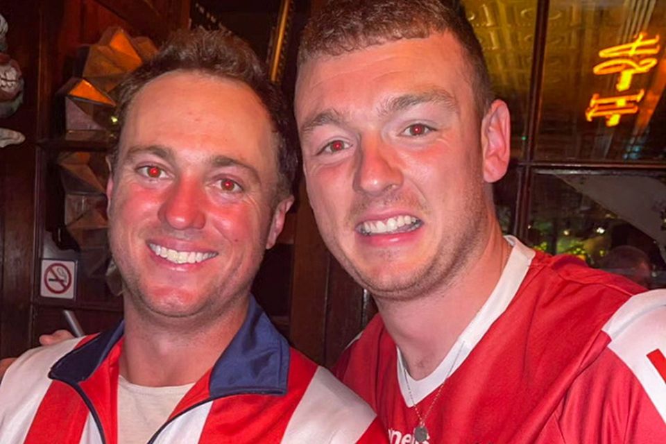 Cork fan Kevin Sheehan (right) and pro golfer Justin Thomas in a pub in Dublin