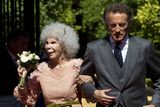 thumbnail: Spain's Duchess of Alba, Maria del Rosario Cayetana Fitz-James-Stuart and her husband Alfonso Diez walk towards photographers after their wedding ceremony at the Palacio de las Duenas on October 5, 2011 in Seville, Spain.  (Photo by Daniel Perez/Getty Images)