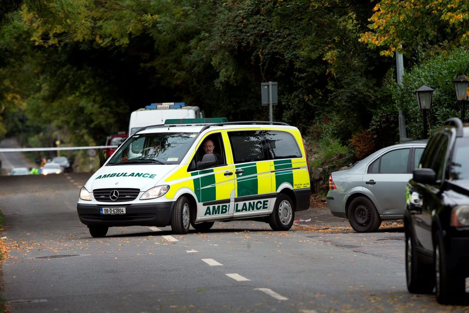 The ambulance hearse at the entrance of the halting site of the tragic fire at Glenmaluck Road, Carrickmines where it was bringing away the bodies of the deceased victims. Photo: Tony Gavin. 
Photo: Tony Gavin 10/10/2015
