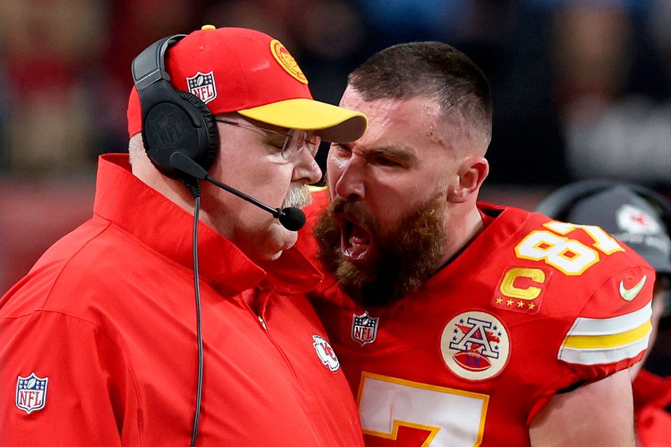 Travis Kelce of the Kansas City Chiefs reacts at coach Andy Reid in the first half against the San Francisco 49ers