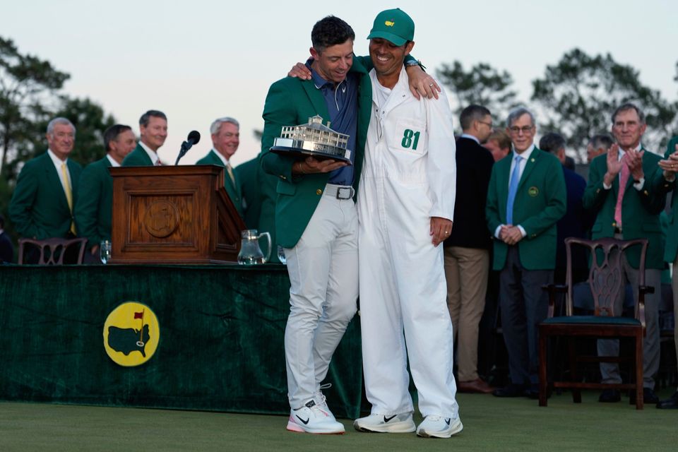 Rory McIlroy with caddie Harry Diamond. Photo: Ashley Landis/AP