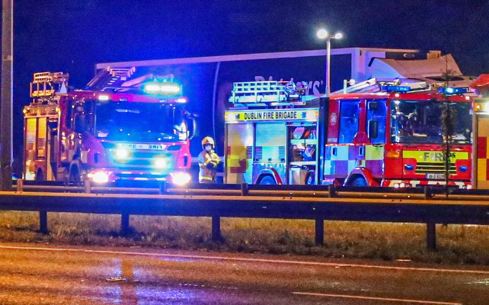 Emergency services at the scene of the fatal road
                crash involving a truck and a car which occurred on the
                N7 at Junction 3, just before Rathcoole. Photo: Damien
                Storan.