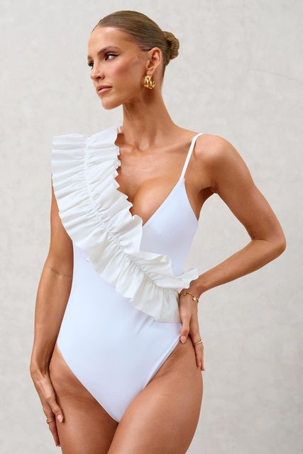 'Sandy Shores' white asymmetric ruffle swimsuit, clubllondon.com