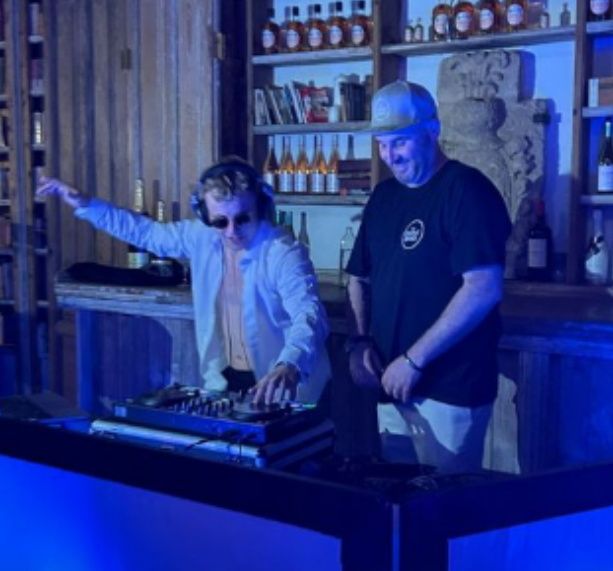 Munster scrumhalf Craig Casey was photographed taking over the DJ duties. Photo: @harrietbeirne
