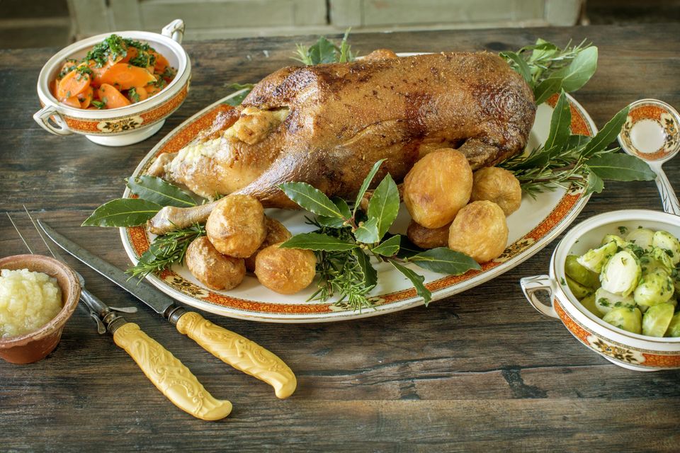 Rachel Allen's roast Christmas goose with glazed carrots, Brussels sprouts and Bramley apple sauce. Photo: Tony Gavin