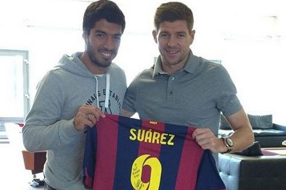 Steven Gerrard pictured with Luis Suarez at Liverpool's Melwood training complex