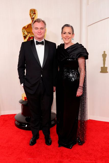 HOLLYWOOD, CALIFORNIA - MARCH 10: (L-R) Christopher Nolan and Emma Thomas attend the 96th Annual Academy Awards on March 10, 2024 in Hollywood, California. (Photo by Mike Coppola/Getty Images)