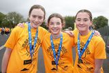 thumbnail: Jessica O'Connor, Ayla Lowe and Lily Lawless from St. Laurence O'Toole's NS, Roundwood at the Marathon Kids Run in Ballymore Eustace GAA. Photo: Michael Kelly