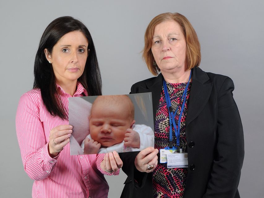 Sergeant Maeve O’ Sullivan, Child Protection Unit, Clondalkin and Rita Byrne, Principal Social worker, Tusla, holding a photograph of baby Maria who was found on May 8 last year