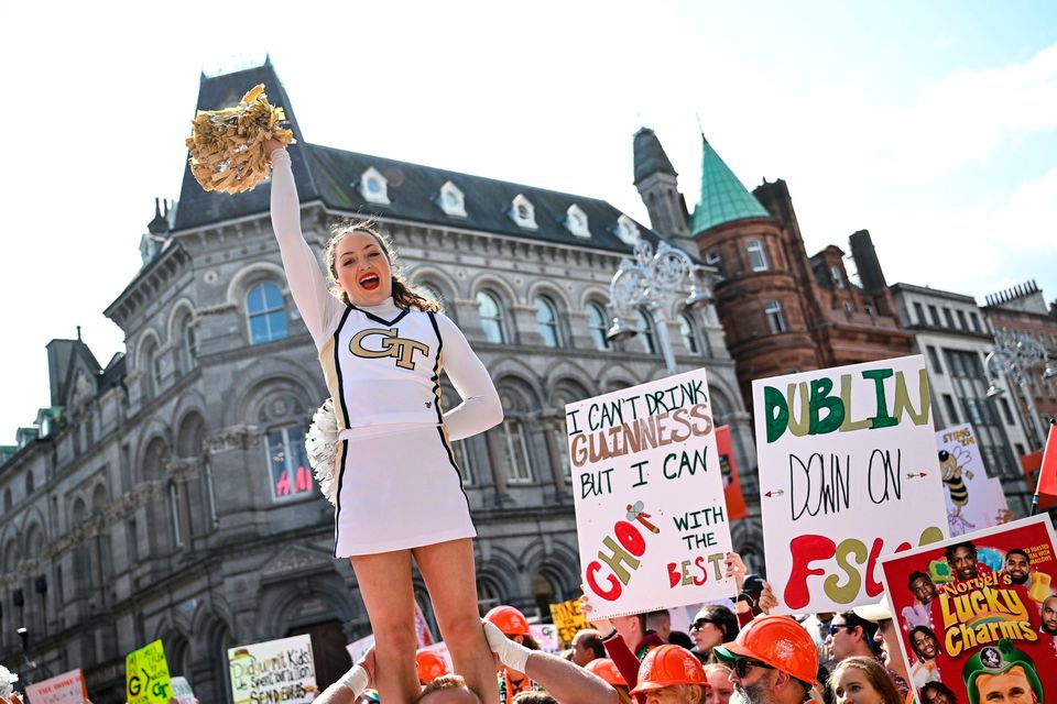 24 August 2024; Georgia Tech cheerleader Sam Noe during the ESPN College GameDay pre-match event in Dublin ahead of the 2024 Aer Lingus College Football Classic match between Florida State and Georgia Tech at the Aviva Stadium. Photo by David Fitzgerald/Sportsfile 